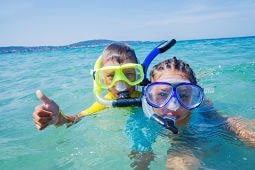 <p>Our aquatic adventures are also directed towards our younger fans.<br />No one needs convincing that children love being in the water.<br />They can spend hours playing, throwing projectiles from the ocean and observing the fish.</p>
<p>Why not give your children something more ... a chance to go diving?<br />Diving programs for children are specially designed by American specialists in order to ensure maximum safety and maximum fun. Children from 10 years old are permitted to experience the adventure of diving, under the direct supervision of a PADI professional instructor.<br />In their first class they will learn breathing underwater and become familiar with the bubbles.</p>
<p>Diving is a clever combination of fun, sport and education about the beauty and needs of the aquatic environment, which constitutes over 70% of the surface of our planet. With this activity, our aim and purpose is to teach children the importance of the oceans in our day to day life.</p>
<p>And if your child shows an overall passion for diving, we offer a course Junior Open Water Diver.<br />Junior OWD is the speed at which the child receives a PADI diving certificate. Children over 10 years old acquire the same training as adults, doing it in shallower waters. The maximum immersion is 12 meters deep.</p>
<p>During all activities we take pictures as a reminder of their first dive. ¡Don´t forget to ask for them!</p>